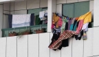 不要在阳台晒衣服；违规者将面临 1,000 迪拉姆罚款