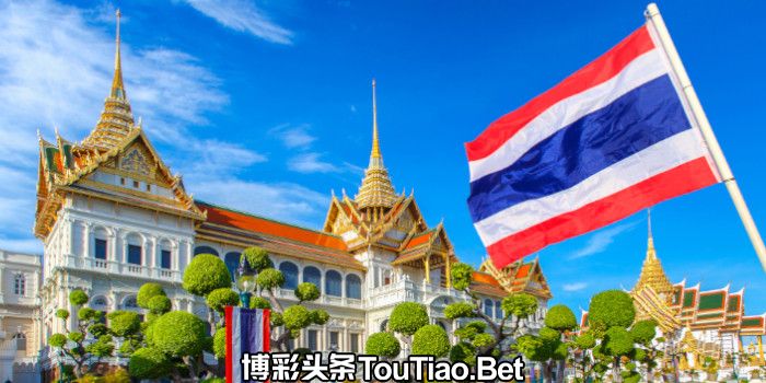 Grand palace in Thailand with flag